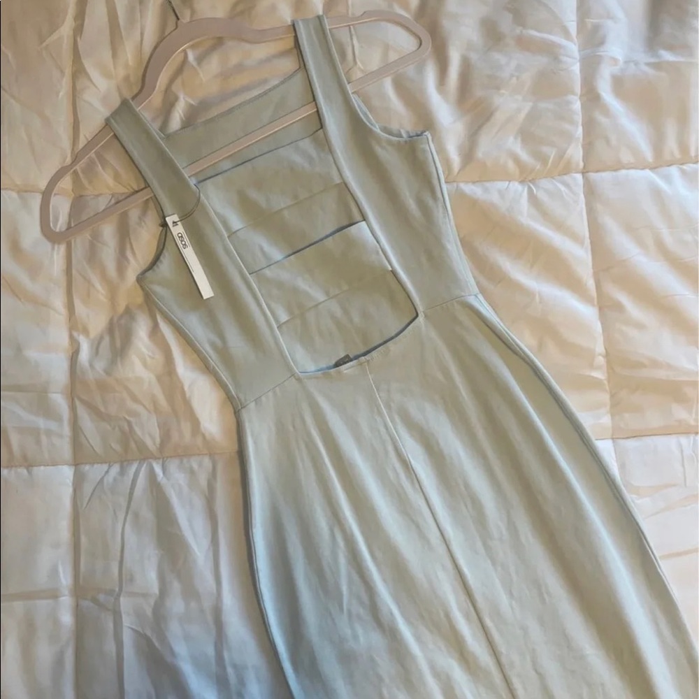 Light blue bodycon knee length dress.